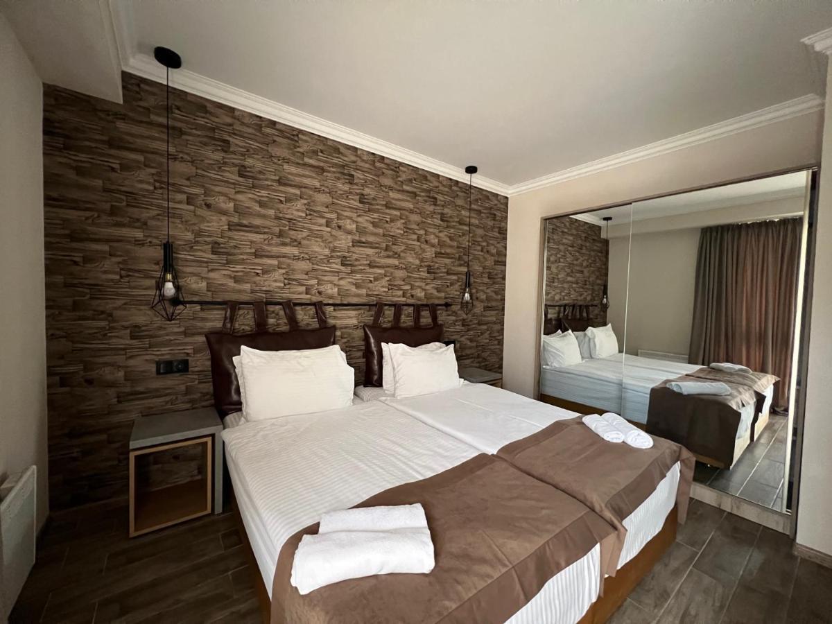 Gudauri Loft Hotel Exterior photo A bedroom in a hotel