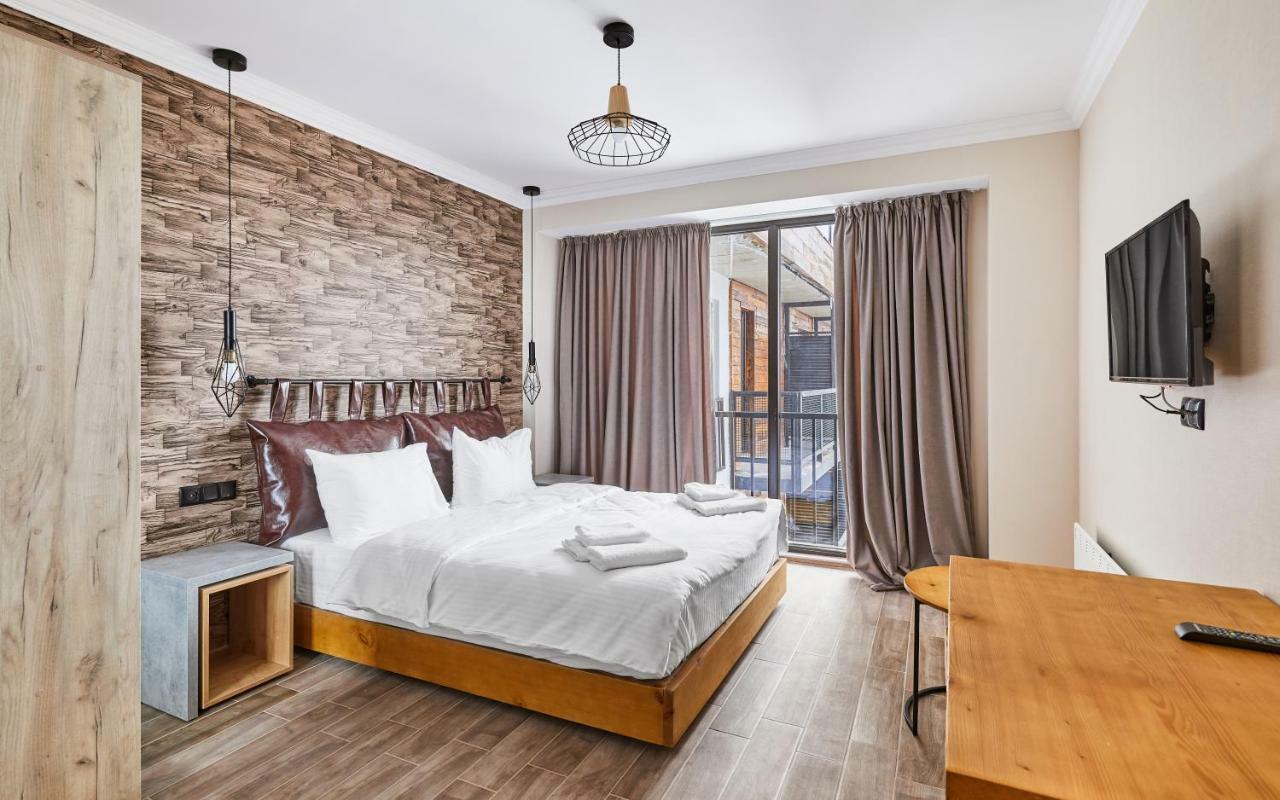 Gudauri Loft Hotel Exterior photo A bedroom in a hotel
